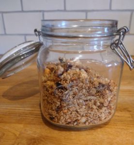 A jar filled with homemade granola