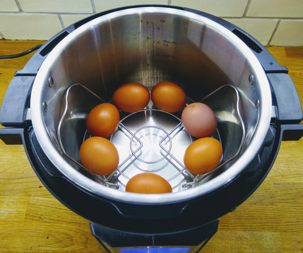 An Instant Pot Duo with 7 eggs about to be boiled  